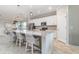 Modern kitchen featuring granite countertops, white cabinetry, and stainless steel appliances at 14049 Black Beauty Dr # 721, Punta Gorda, FL 33955