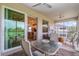Inviting screened lanai with comfortable seating and golf course views at 14049 Black Beauty Dr # 721, Punta Gorda, FL 33955