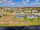 Birds eye view showing home in a great neighborhood near a beautiful canal at 149 Sportsman Rd, Rotonda West, FL 33947