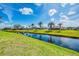 A beautiful canal runs through the backyard of these properties at 149 Sportsman Rd, Rotonda West, FL 33947