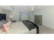 Comfortable bedroom featuring a blue velvet bed, plush carpeting, and dresser at 149 Sportsman Rd, Rotonda West, FL 33947