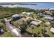 Aerial view of a home with a pool and canal front backyard at 156 Danforth Dr, Punta Gorda, FL 33980