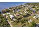 Wide aerial view of a charming community with access to stunning coastal waters at 156 Danforth Dr, Punta Gorda, FL 33980