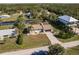 Aerial view of front yard and a long driveway at 156 Danforth Dr, Punta Gorda, FL 33980