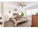 Cozy bedroom offers neutral tones, a ceiling fan, and a comfortable atmosphere at 156 Danforth Dr, Punta Gorda, FL 33980