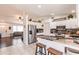 Open kitchen featuring granite countertops, stainless appliances, and seamless flow into the living area at 156 Danforth Dr, Punta Gorda, FL 33980