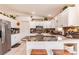 Bright kitchen boasts granite countertops, stainless steel appliances, and ample storage at 156 Danforth Dr, Punta Gorda, FL 33980