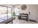 Bright kitchen area featuring a breakfast bar and views of the screened-in pool area at 156 Danforth Dr, Punta Gorda, FL 33980