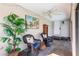 Inviting lanai with comfortable wicker seating, charming decor, and a calming atmosphere at 156 Danforth Dr, Punta Gorda, FL 33980