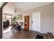 Relaxing outdoor lanai with ceiling fan, wicker seating and decor for comfortable lounging at 156 Danforth Dr, Punta Gorda, FL 33980