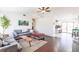Comfortable living room featuring hardwood floors and an adjacent kitchen at 156 Danforth Dr, Punta Gorda, FL 33980