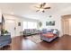 Inviting living room boasts hardwood floors, ceiling fan and plenty of natural light at 156 Danforth Dr, Punta Gorda, FL 33980