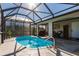Sun-drenched pool in a screened enclosure, creating a perfect outdoor relaxation space at 156 Danforth Dr, Punta Gorda, FL 33980