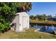Waterfront shed, next to canal, and mature trees at 156 Danforth Dr, Punta Gorda, FL 33980