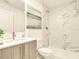 Bathroom with marble tile shower, modern vanity, and stylish decor at 16210 Cape Horn Blvd, Punta Gorda, FL 33955