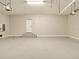 Clean garage with sealed floor, providing ample space and storage at 16210 Cape Horn Blvd, Punta Gorda, FL 33955