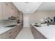 Gourmet kitchen with modern cabinets, quartz countertops, and stainless steel appliances; a chef's dream at 16210 Cape Horn Blvd, Punta Gorda, FL 33955