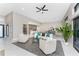 Open-concept living room featuring neutral tones and stylish furnishings, creating an inviting atmosphere at 16210 Cape Horn Blvd, Punta Gorda, FL 33955
