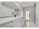 Stylish bathroom featuring a spacious vanity, modern fixtures, and a sleek glass shower at 165 Cummins Ne Ave, Port Charlotte, FL 33952