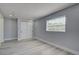 Bedroom with neutral paint, stylish floors, and closet storage at 165 Cummins Ne Ave, Port Charlotte, FL 33952