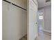 Inside a closet with white walls and trim with a clothes rod at 165 Cummins Ne Ave, Port Charlotte, FL 33952
