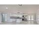 Spacious kitchen with stainless appliances, granite countertops, and a large island at 165 Cummins Ne Ave, Port Charlotte, FL 33952