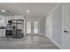 Open concept kitchen with stainless steel appliances and direct access to the pool at 165 Cummins Ne Ave, Port Charlotte, FL 33952