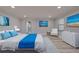 Cozy main bedroom with coastal decor, recessed lighting and hardwood floors at 165 Cummins Ne Ave, Port Charlotte, FL 33952