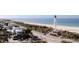 Aerial view of a home close to the beach and lighthouse at 17 White Marsh Ln, Rotonda West, FL 33947