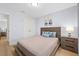 Bright bedroom with wooden accents, ample lighting and comfortable bed at 17 White Marsh Ln, Rotonda West, FL 33947