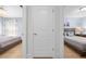 Dual bedrooms with ample light and wood floors at 17 White Marsh Ln, Rotonda West, FL 33947