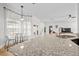 Open kitchen featuring granite countertops, bright natural light, and a kitchen bar area with bright natural light at 17 White Marsh Ln, Rotonda West, FL 33947
