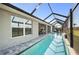 Inviting pool with screened lanai, and an outdoor lounge area perfect for relaxation at 17 White Marsh Ln, Rotonda West, FL 33947