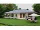 Spacious backyard features a covered patio, seating area, and lush green lawn with mature trees at 17196 Glenview Ave, Port Charlotte, FL 33954