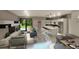 Open-concept living and kitchen area features modern finishes, sleek furniture, and an airy atmosphere at 17196 Glenview Ave, Port Charlotte, FL 33954