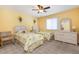 Charming bedroom with twin beds, wicker furniture, and soft, neutral tones at 22375 Edgewater Dr # 149, Punta Gorda, FL 33980