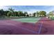 Enjoy an active lifestyle on this well-maintained tennis court surrounded by lush greenery at 22375 Edgewater Dr # 149, Punta Gorda, FL 33980