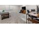 Spacious basement featuring neutral carpet and furniture perfect for a game room or media room at 2486 Buckthorn Loop, North Port, FL 34289