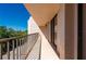 Long, covered balcony offers serene views and ample space for outdoor enjoyment at 25188 Marion Ave # D303, Punta Gorda, FL 33950