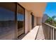 Spacious balcony with sliding glass doors, perfect for enjoying the outdoor scenery at 25188 Marion Ave # D303, Punta Gorda, FL 33950