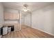 Bedroom with built-in storage, mirrored closet and laminate flooring at 25188 Marion Ave # D303, Punta Gorda, FL 33950