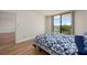 Bedroom with a view, natural light and neutral tones at 25188 Marion Ave # D303, Punta Gorda, FL 33950