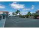 Enjoy a match on this well-maintained tennis court surrounded by lush landscaping and blue skies at Emerald Pointe at 25188 Marion Ave # D303, Punta Gorda, FL 33950