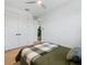 Well-lit bedroom with a modern ceiling fan and a door leading to another room at 260 Long Meadow Ln, Rotonda West, FL 33947