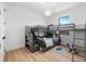 bedroom with modern bunkbeds, a bright window, and playful decor on the floor at 260 Long Meadow Ln, Rotonda West, FL 33947