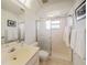 Bathroom featuring a tiled shower, toilet and single vanity at 26389 Villa Maria Dr, Punta Gorda, FL 33983