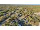 Overhead neighborhood view featuring well-maintained homes and abundant mature landscaping at 267 Camrose St, Port Charlotte, FL 33954