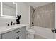 Modern bathroom featuring a single vanity, tub, and shower combo at 267 Camrose St, Port Charlotte, FL 33954