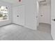 Bright bedroom with tile floors, neutral paint, double closets, and a window for natural light at 267 Camrose St, Port Charlotte, FL 33954