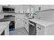 Bright kitchen features modern stainless appliances, stylish countertops, and a window view at 267 Camrose St, Port Charlotte, FL 33954